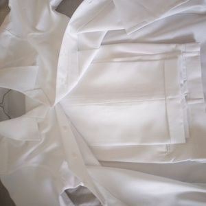 All white linen suit and Kobe's gym shoes